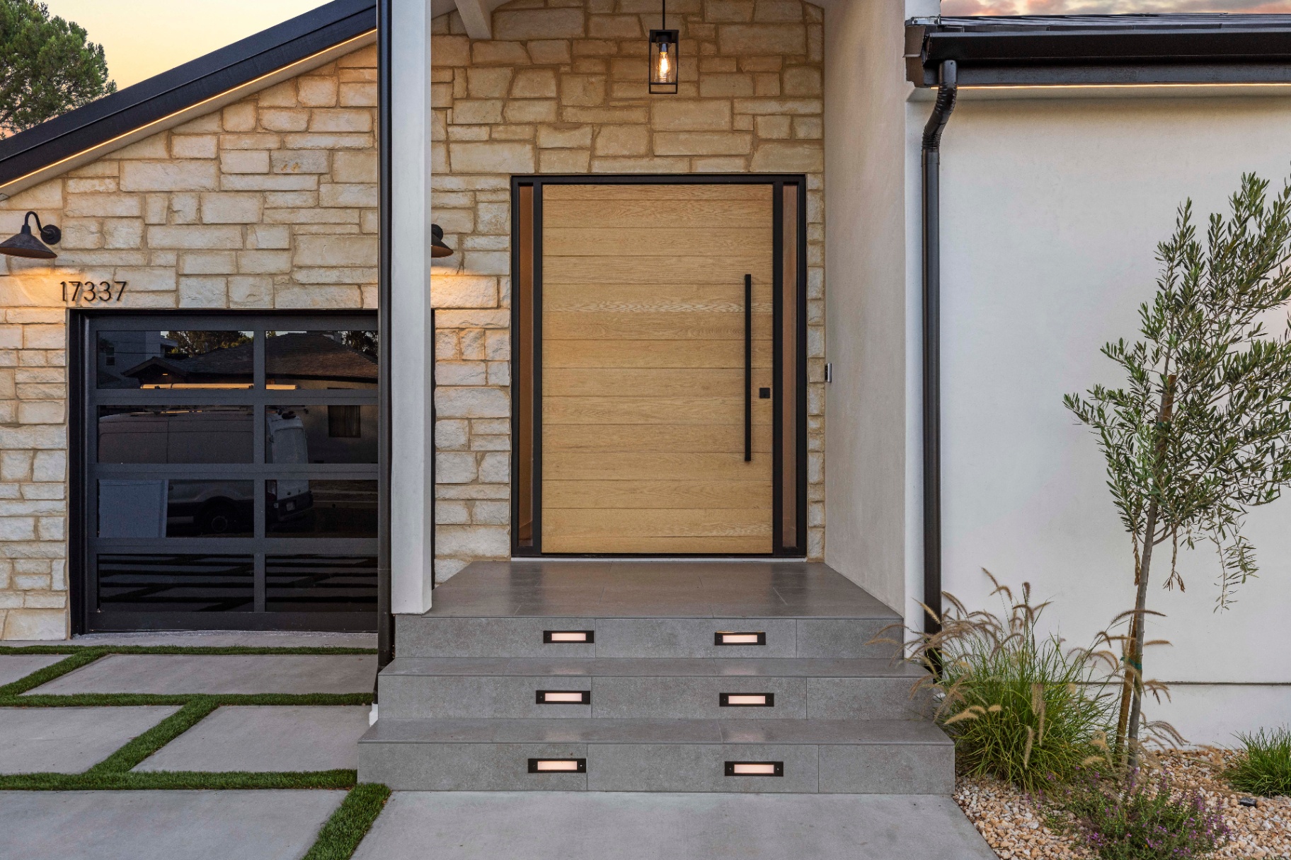 front entry — oak pivot door