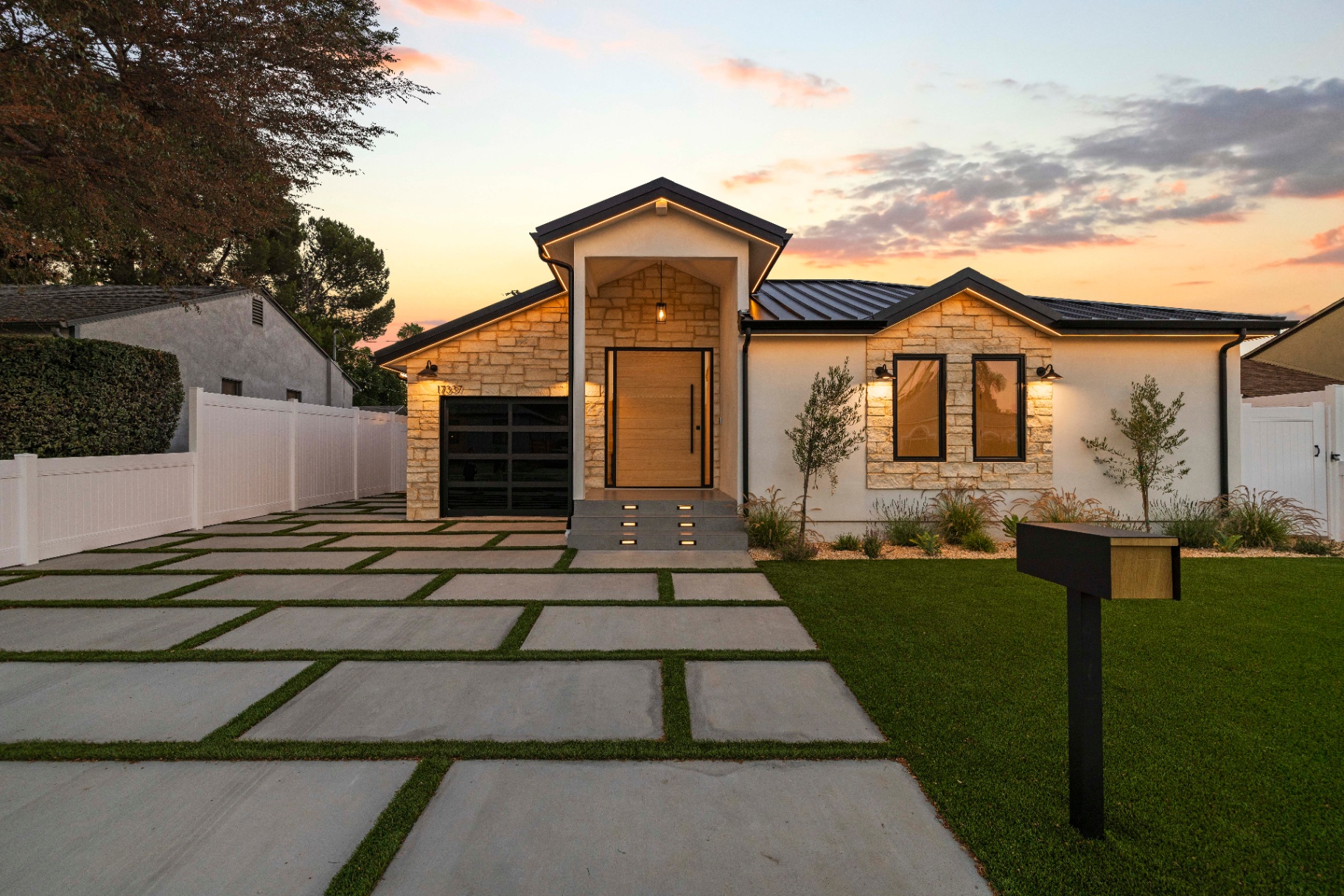front exterior — straight-on dusk view